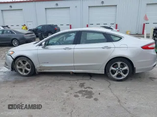 2014 Ford Fusion SE Hybrid with VIN 3FA6P0LU7ER176612, listed as a IAAI auction lot 41456075 with 101,621 mi miles and . Bid and sale history available at DreamBid. Image 13.
