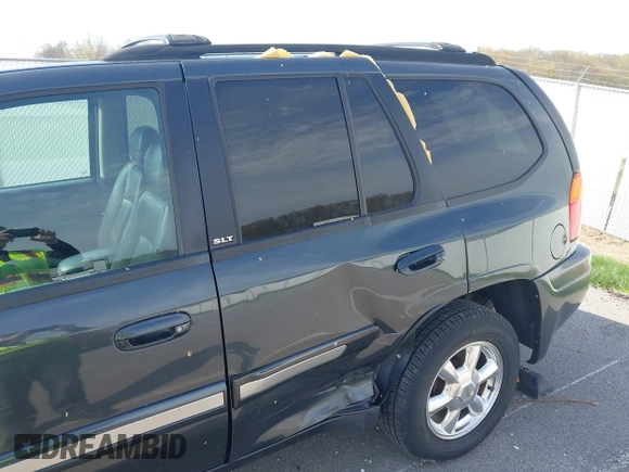 2005 GMC Envoy SLE with VIN 1GKDT13S052299632, listed as a IAAI auction lot 41966628 with 199,312 mi miles and . Bid and sale history available at DreamBid. Image 6.