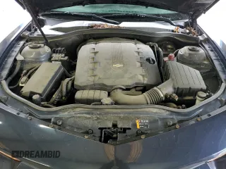 2014 Chevrolet Camaro LS z VIN 2G1FA1E30E9131502, wystawiony jako Copart lot #58161235 z przebiegiem 91 986 mil mil oraz Szkoda całkowita • Salvage title. Historia ofert i sprzedaży dostępna na DreamBid. Obrazek 11.