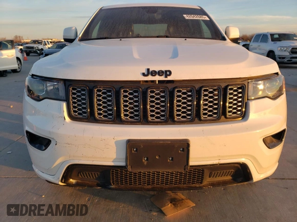 2022 Jeep Grand Cherokee Laredo X with VIN 1C4RJEAG4NC154150, listed as a Copart auction lot 42042685 with 64,155 mi miles and Salvage title. Bid and sale history available at DreamBid. Image 5.