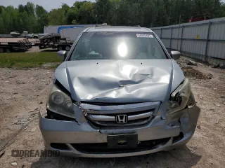 2007 Honda Odyssey EX-L with VIN 5FNRL38657B059033, listed as a Copart auction lot 54005495 with 212,674 mi miles and Salvage Title. Bid and sale history available at DreamBid. Image 5.