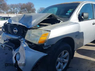 2004 Nissan Titan SE with VIN 1N6AA06A74N553025, listed as a IAAI auction lot 41466773 with 182,110 mi miles. Bid and sale history available at carsss.com. Image 18.