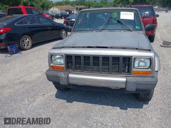2000 Jeep Cherokee with VIN 1J4FF48S5YL174768, listed as a IAAI auction lot 42411154 with 204,428 mi miles and . Bid and sale history available at DreamBid. Image 13.