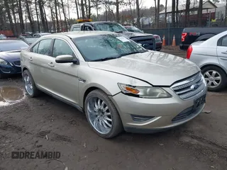 2011 Ford Taurus SEL with VIN 1FAHP2EW4BG147591, listed as a IAAI auction lot 41754058 with 167,271 mi miles. Bid and sale history available at carsss.com. Image 1.