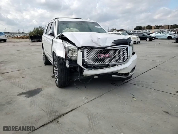 2017 GMC Yukon Denali with VIN 1GKS2CKJ1HR202917, listed as a Copart auction lot 77452134 with 110,640 mi miles and Salvage Title. Bid and sale history available at carsss.com. Image 14.