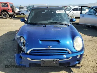 2005 MINI Convertible S z VIN WMWRH33565TK56154, wystawiony jako Copart lot #55860025 z przebiegiem 59 672 mil mil oraz Szkoda całkowita • Salvage title. Historia ofert i sprzedaży dostępna na DreamBid. Obrazek 5.