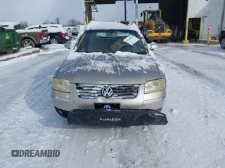 2004 Volkswagen Passat GLS z VIN WVWVD63B14E178308, wystawiony jako IAAI lot #41346616 z przebiegiem 188 238 mil mil oraz . Historia ofert i sprzedaży dostępna na DreamBid. Obrazek 12.