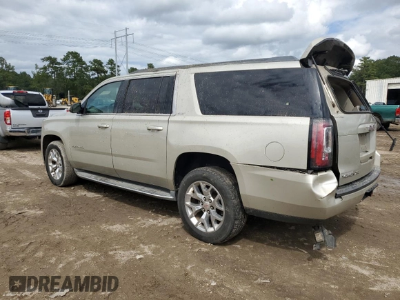 2015 GMC Yukon XL SLT with VIN 1GKS1HKC5FR168608, listed as a Copart auction lot 71564384 with 197,538 mi miles and Salvage Title. Bid and sale history available at carsss.com. Image 2.