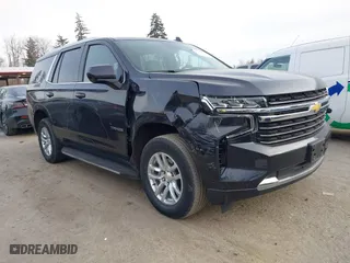 2023 Chevrolet Tahoe LT with VIN 1GNSCNKD2PR320429, listed as a IAAI auction lot 41473602 with 55,222 mi miles. Bid and sale history available at carsss.com. Image 1.