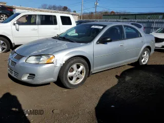 2006 Dodge Stratus SXT z VIN 1B3EL46X46N221753, wystawiony jako Copart lot #79672984 z przebiegiem 168 863 mil mil oraz Czysty tytuł • Clean title. Historia ofert i sprzedaży dostępna na DreamBid. Obrazek 1.