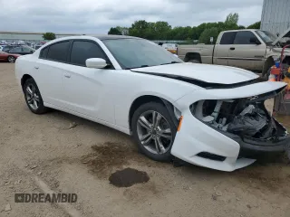 2015 Dodge Charger SXT with VIN 2C3CDXJG7FH779296, listed as a Copart auction lot 58490215 with 173,371 mi miles and Clean title. Bid and sale history available at DreamBid. Image 4.