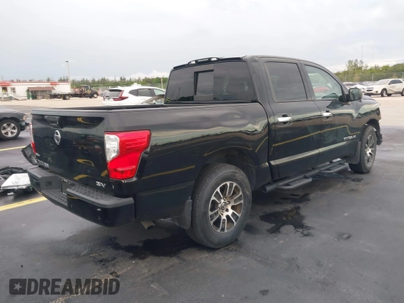 2021 Nissan Titan SV with VIN 1N6AA1EF4MN503458, listed as a IAAI auction lot 42401074 with 53,558 mi miles and . Bid and sale history available at DreamBid. Image 4.