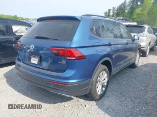 2018 Volkswagen Tiguan S with VIN 3VV0B7AXXJM018455, listed as a IAAI auction lot 41979115 with 92,104 mi miles and . Bid and sale history available at DreamBid. Image 4.