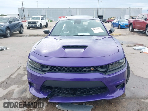 2023 Dodge Charger Scat Pack Widebody with VIN 2C3CDXGJ5PH699595, listed as a IAAI auction lot 41303894 with 1,828 mi miles and . Bid and sale history available at DreamBid. Image 13.