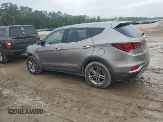 2017 Hyundai Santa Fe 2.4L z VIN 5NMZT3LBXHH038022, wystawiony jako Copart lot #51060545 z przebiegiem 63 790 mil mil oraz Szkoda całkowita • Salvage title. Historia ofert i sprzedaży dostępna na DreamBid. Obrazek 2.