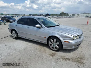 2005 Jaguar X-Type 3.0L with VIN SAJWA51C75WE23809, listed as a Copart auction lot 68457634 with 161,422 mi miles and Non Repairable. Bid and sale history available at carsss.com. Image 4.