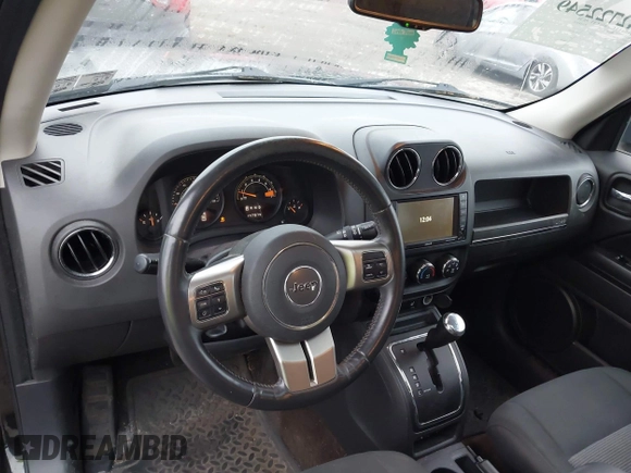 2014 Jeep Patriot Latitude with VIN 1C4NJRFB1ED501740, listed as a IAAI auction lot 42722549 with 147,974 mi miles and . Bid and sale history available at DreamBid. Image 14.