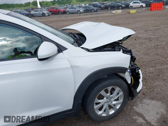 2019 Hyundai Tucson Value z VIN KM8J33A41KU013023, wystawiony jako IAAI lot #42302643 z przebiegiem 41 231 mil mil oraz . Historia ofert i sprzedaży dostępna na DreamBid. Obrazek 6.