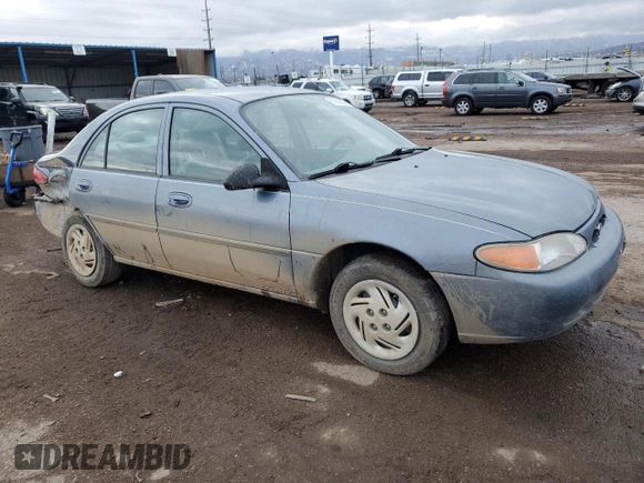 1999 Ford Escort LX z VIN 1FAFP10P6XW217588, wystawiony jako Copart lot #81360454 z przebiegiem 78 977 mil mil oraz Szkody całkowita. Historia ofert i sprzedaży dostępna na DreamBid. Obrazek 4.