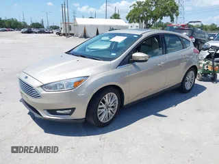 2017 Ford Focus Titanium с VIN 1FADP3N21HL327581, выставлен на аукционе IAAI как лот 42342179 с пробегом 61 489 миль миль и . История ставок и продаж доступна на DreamBid. Изображение 2.