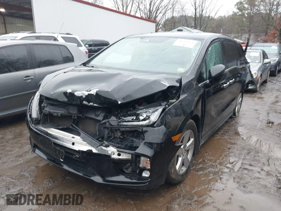 2019 Honda Odyssey EX-L with VIN 5FNRL6H75KB087076, listed as a IAAI auction lot 41796779 with 136,491 mi miles. Bid and sale history available at carsss.com. Image 2.