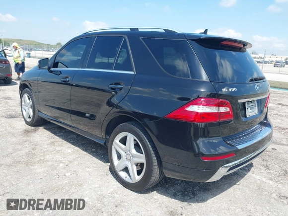 2015 Mercedes-Benz M 400 with VIN 4JGDA5GB4FA559004, listed as a IAAI auction lot 41932299 with 84,749 mi miles and . Bid and sale history available at DreamBid. Image 3.