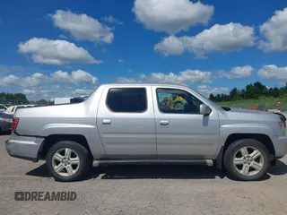 2013 Honda Ridgeline RTL with VIN 5FPYK1F51DB007236, listed as a IAAI auction lot 42762126 with 201,758 mi miles and . Bid and sale history available at DreamBid. Image 13.