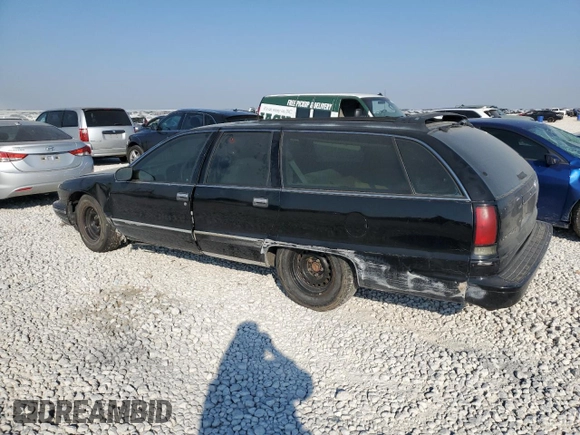 1996 Chevrolet Caprice with VIN 1G1BL82P2TR106404, listed as a Copart auction lot 74213214 with 156,588 mi miles and Salvage title. Bid and sale history available at DreamBid. Image 2.