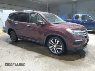2017 Honda Pilot Touring with VIN 5FNYF6H99HB024088, listed as a Copart auction lot 88650165 with 123,964 mi miles and Salvage Title. Bid and sale history available at DreamBid. Image 4.