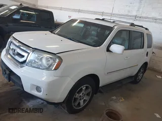 2010 Honda Pilot Touring with VIN 5FNYF4H95AB019903, listed as a IAAI auction lot 42196082 with 233,527 mi miles and . Bid and sale history available at carsss.com. Image 17.