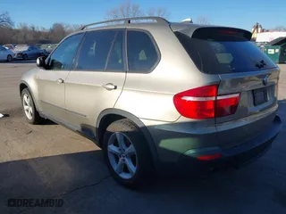 2007 BMW X5 3.0si with VIN 5UXFE43557L011254, listed as a IAAI auction lot 41696843 with 201,402 mi miles. Bid and sale history available at carsss.com. Image 3.