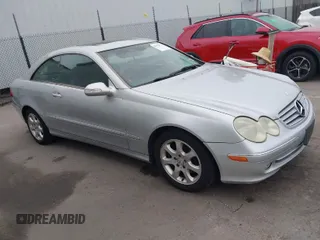 2004 Mercedes-Benz CLK 3.2L with VIN WDBTJ65J34F097968, listed as a IAAI auction lot 41862477 with 187,619 mi miles. Bid and sale history available at carsss.com. Image 1.