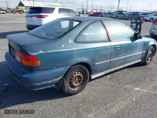 1997 Honda Civic DX with VIN 1HGEJ622XVL073128, listed as a IAAI auction lot 41721903 with 177,616 mi miles. Bid and sale history available at carsss.com. Image 4.