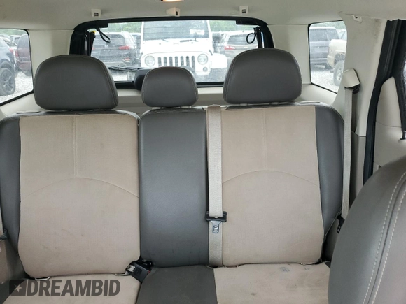 2010 Mercury Mariner Premier with VIN 4M2CN8HG3AKJ16128, listed as a Copart auction lot 58649895 with 157,798 mi miles and Salvage title. Bid and sale history available at DreamBid. Image 10.