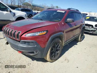 2015 Jeep Cherokee Trailhawk with VIN 1C4PJMBBXFW615145, listed as a Copart auction lot 47294225 with 99,662 mi miles and Salvage Title. Bid and sale history available at carsss.com. Image 1.