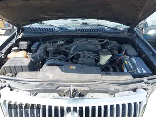 2002 Mercury Mountaineer z VIN 4M2DU66E22ZJ04557, wystawiony jako IAAI lot #42149813 z przebiegiem 320 154 mil mil oraz . Historia ofert i sprzedaży dostępna na DreamBid. Obrazek 10.