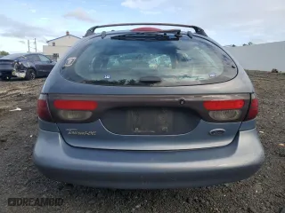 1999 Ford Taurus SE with VIN 1FAFP58S2XA261374, listed as a Copart auction lot 74180494 with 193,416 mi miles and Salvage Title. Bid and sale history available at carsss.com. Image 6.