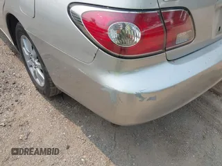 2004 Lexus ES 350 z VIN JTHBA30G145000388, wystawiony jako IAAI lot #42417373 z przebiegiem 294 899 mil mil oraz . Historia ofert i sprzedaży dostępna na DreamBid. Obrazek 6.