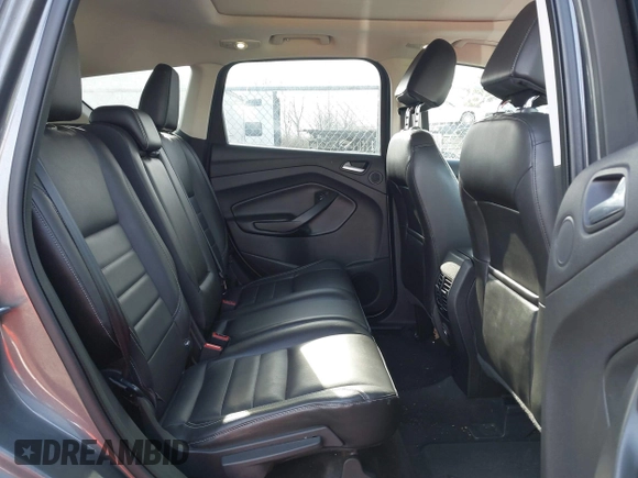 2013 Ford Escape SEL with VIN 1FMCU9H92DUA24934, listed as a IAAI auction lot 41832566 with 124,705 mi miles. Bid and sale history available at carsss.com. Image 8.