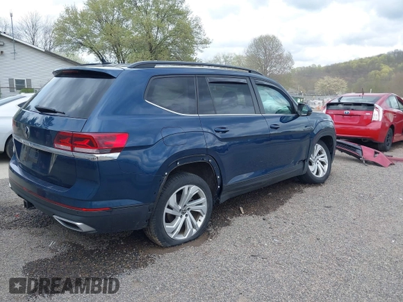 2021 Volkswagen Atlas SE z VIN 1V2JR2CA9MC547054, wystawiony jako IAAI lot #42090923 z przebiegiem 40 011 mil mil oraz . Historia ofert i sprzedaży dostępna na DreamBid. Obrazek 4.