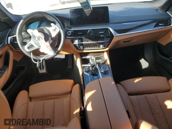 2023 BMW 5 Series 530e with VIN WBA13AG02PCL73814, listed as a Copart auction lot 86818824 with Not provided miles and Salvage title. Bid and sale history available at DreamBid. Image 8.
