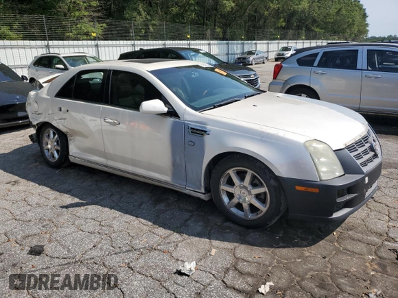 2008 Cadillac STS RWD z VIN 1G6DZ67A880189536, wystawiony jako Copart lot #71026144 z przebiegiem 178 958 mil mil oraz Szkoda całkowita • Salvage title. Historia ofert i sprzedaży dostępna na DreamBid. Obrazek 4.