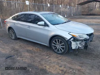 2014 Toyota Avalon Limited with VIN 4T1BK1EB4EU090185, listed as a IAAI auction lot 41715194 with 120,489 mi miles and . Bid and sale history available at carsss.com. Image 1.