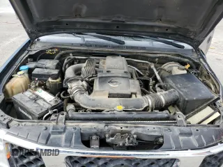 2006 Nissan Frontier Nismo z VIN 1N6AD07W26C438235, wystawiony jako Copart lot #60685544 z przebiegiem 164 137 mil mil oraz Szkoda całkowita • Salvage title. Historia ofert i sprzedaży dostępna na DreamBid. Obrazek 13.
