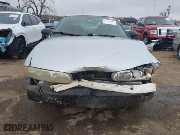 2003 Oldsmobile Alero GL1 z VIN 1G3NL52F43C169291, wystawiony jako IAAI lot #41546681 z przebiegiem 176 341 mil mil oraz . Historia ofert i sprzedaży dostępna na DreamBid. Obrazek 13.