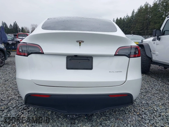 2023 Tesla Model Y Long Range with VIN 7SAYGDEE7PF809164, listed as a IAAI auction lot 41828974 with 31,772 mi miles. Bid and sale history available at carsss.com. Image 16.