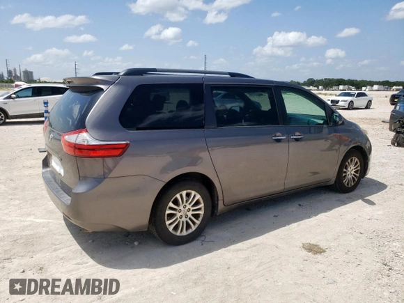 2015 Toyota Sienna XLE with VIN 5TDYK3DC4FS629558, listed as a Copart auction lot 64062045 with 172,669 mi miles and Clean title. Bid and sale history available at DreamBid. Image 3.