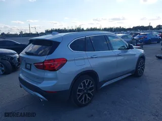 2020 BMW X1 sDrive28i with VIN WBXJG7C08L5R71214, listed as a IAAI auction lot 41514330 with 34,140 mi miles. Bid and sale history available at carsss.com. Image 4.