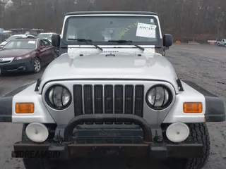 2006 Jeep Wrangler X with VIN 1J4FA39SX6P709588, listed as a IAAI auction lot 41927435 with 227,990 mi miles. Bid and sale history available at carsss.com. Image 6.