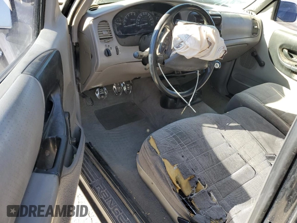 1997 Ford Ranger XLT with VIN 1FTCR15X2VPA50685, listed as a Copart auction lot 81790574 with 128,458 mi miles and Salvage Title. Bid and sale history available at DreamBid. Image 8.